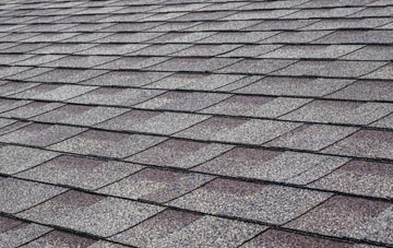 Cressing tiles for shallow pitch roofing